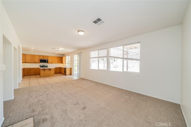 41044 Oak Creek Rd, Murrieta, CA 92562 - unfurnished living room with light carpet, baseboards, and recessed lighting