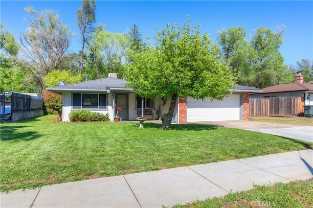 view of front of home with fence, an attached garage, a front lawn, covered porch, and driveway