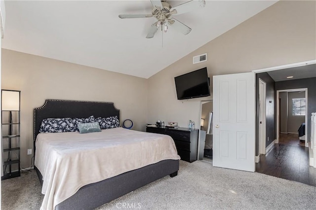 carpeted bedroom featuring high vaulted ceiling, ceiling fan, and visible vents