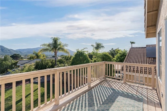 wooden terrace with a mountain view
