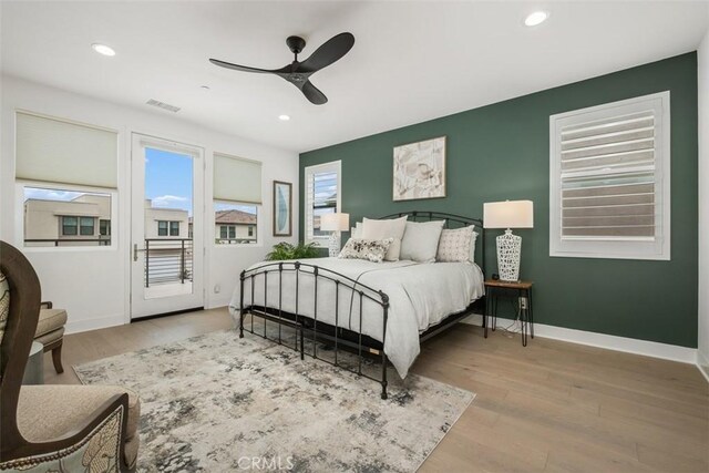 297 Sawbuck, Irvine, CA 92618 - bedroom featuring access to outside, wood finished floors, recessed lighting, baseboards, and a ceiling fan