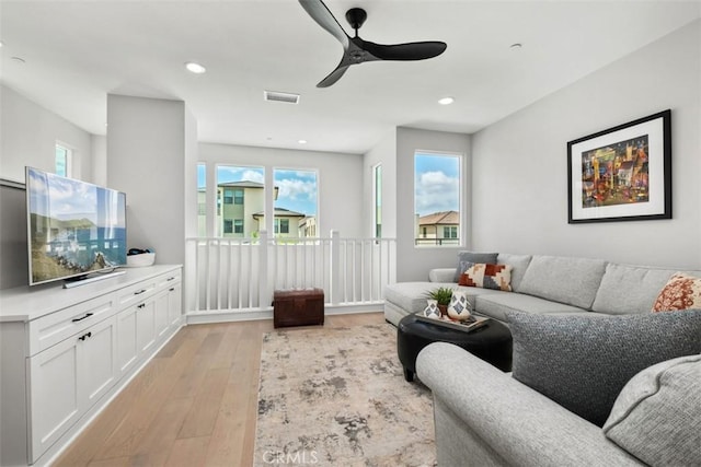 297 Sawbuck, Irvine, CA 92618 - living room with light wood-style flooring, ceiling fan, plenty of natural light, and recessed lighting