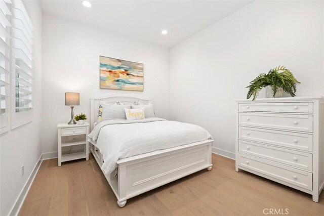 297 Sawbuck, Irvine, CA 92618 - bedroom featuring light wood finished floors, baseboards, and recessed lighting