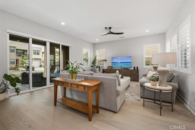 297 Sawbuck, Irvine, CA 92618 - living area featuring light wood-style floors, a ceiling fan, and recessed lighting