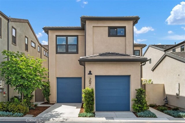 297 Sawbuck, Irvine, CA 92618 - view of property featuring an attached garage, stucco siding, concrete driveway, and a tile roof