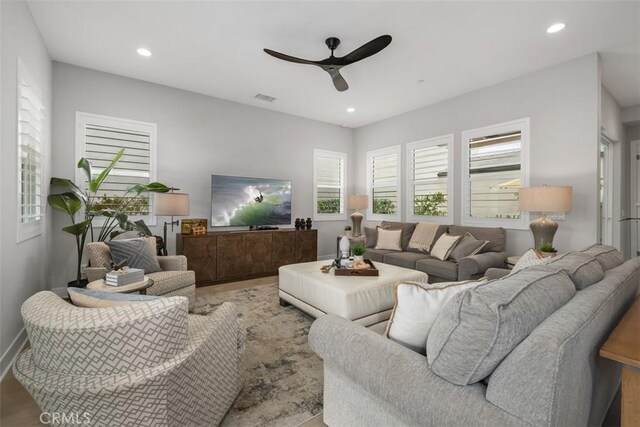 297 Sawbuck, Irvine, CA 92618 - living room featuring ceiling fan, recessed lighting, and wood finished floors