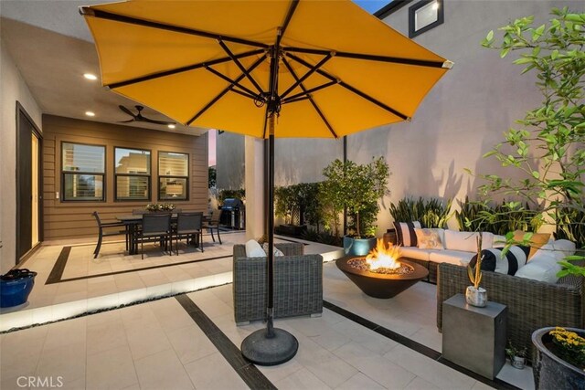 297 Sawbuck, Irvine, CA 92618 - view of patio / terrace with an outdoor living space with a fire pit and outdoor dining space