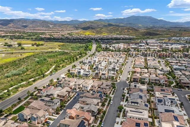 297 Sawbuck, Irvine, CA 92618 - aerial view of property's location featuring a mountainous background and nearby suburban area