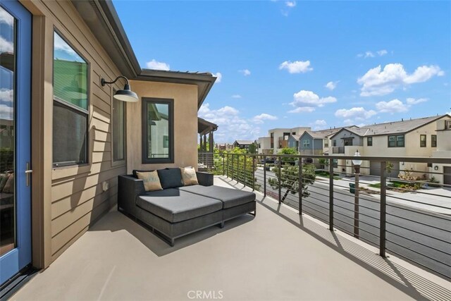 297 Sawbuck, Irvine, CA 92618 - view of patio featuring a balcony and a residential view