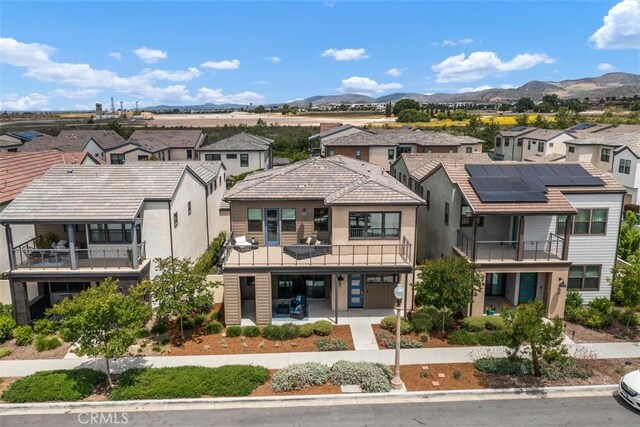 297 Sawbuck, Irvine, CA 92618 - aerial perspective of suburban area with a mountainous background