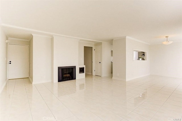 unfurnished living room with crown molding, light tile patterned flooring, and a fireplace