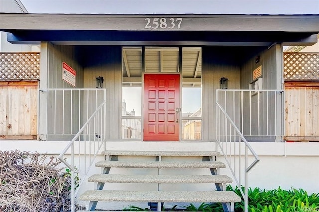 entrance to property with a porch