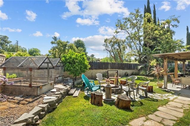 27736 Cherry Creek Dr, Valencia, CA 91354 - view of yard with a garden, a patio, a greenhouse, and fence private yard