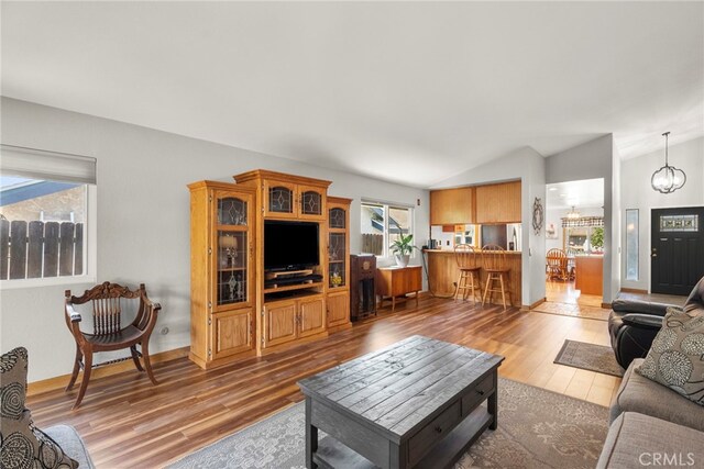27736 Cherry Creek Dr, Valencia, CA 91354 - living room with light wood-style floors and vaulted ceiling