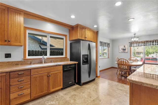 27736 Cherry Creek Dr, Valencia, CA 91354 - kitchen with brown cabinetry, a sink, stainless steel fridge with ice dispenser, and dishwasher