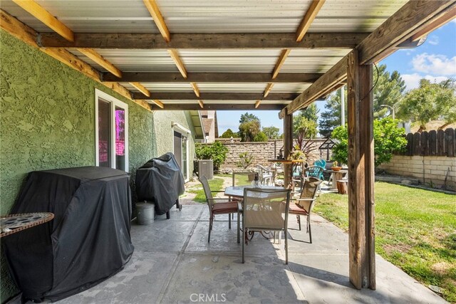 27736 Cherry Creek Dr, Valencia, CA 91354 - view of patio featuring area for grilling, a fenced backyard, and outdoor dining space