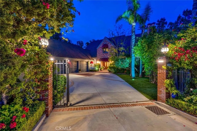 10302 Broadview Pl, North Tustin, CA 92705 - view of front of house featuring fence and concrete driveway