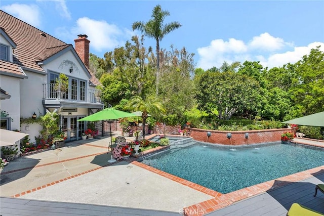 10302 Broadview Pl, North Tustin, CA 92705 - view of swimming pool featuring french doors, a pool with connected hot tub, and a patio area