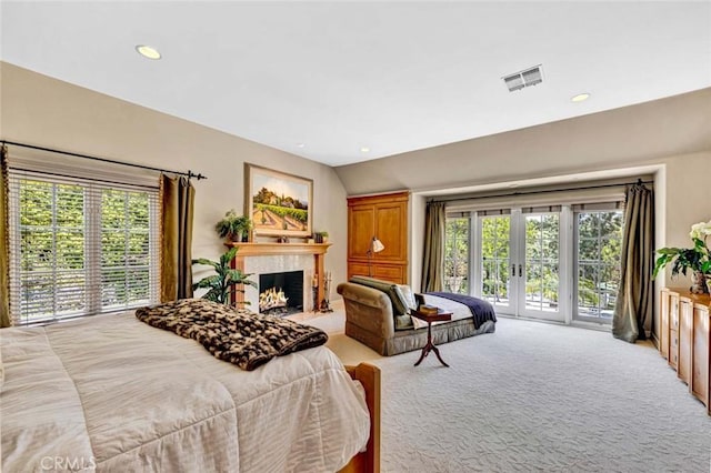 10302 Broadview Pl, North Tustin, CA 92705 - bedroom with visible vents, a fireplace, access to exterior, light colored carpet, and french doors