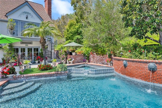 10302 Broadview Pl, North Tustin, CA 92705 - view of swimming pool featuring a pool with connected hot tub, stairs, and a patio area