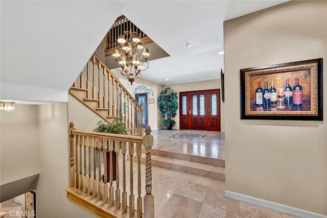 10302 Broadview Pl, North Tustin, CA 92705 - entryway featuring baseboards, an inviting chandelier, and stairway