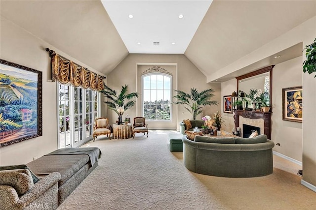 10302 Broadview Pl, North Tustin, CA 92705 - living area with carpet flooring, baseboards, vaulted ceiling, and a fireplace
