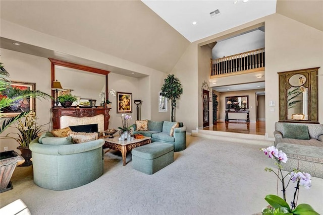 10302 Broadview Pl, North Tustin, CA 92705 - living area featuring carpet floors, visible vents, a fireplace, high vaulted ceiling, and recessed lighting