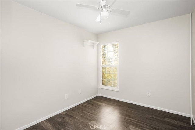 5222 Auburn Cir, Westminster, CA 92683 - empty room featuring baseboards, dark wood-style flooring, and ceiling fan