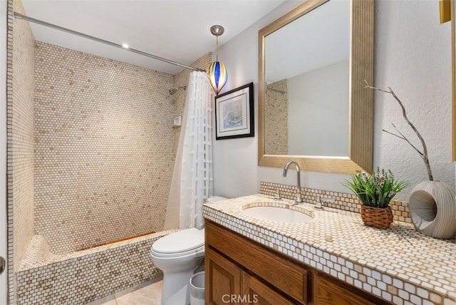 14 Woodsong Dr, Laguna Niguel, CA 92677 - full bathroom featuring toilet, tiled shower, vanity, and tile patterned flooring