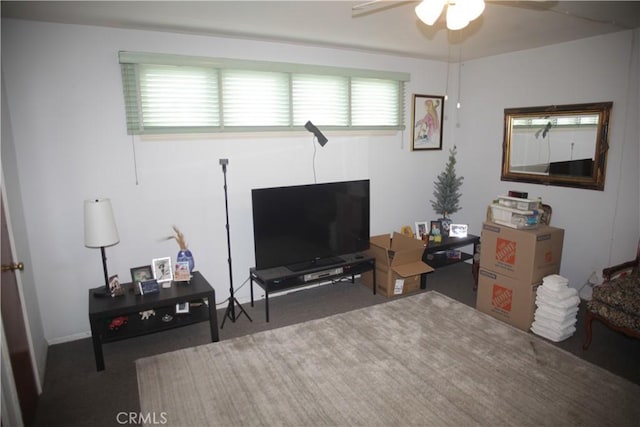 1211 Cole Ave, Los Angeles, CA 90038 - carpeted living room with a ceiling fan