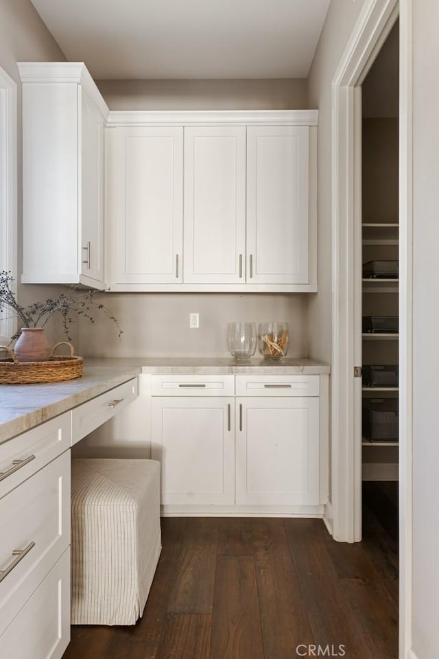 101 Via Artemesia, San Clemente, CA 92672 - kitchen with light countertops, white cabinets, and dark wood finished floors
