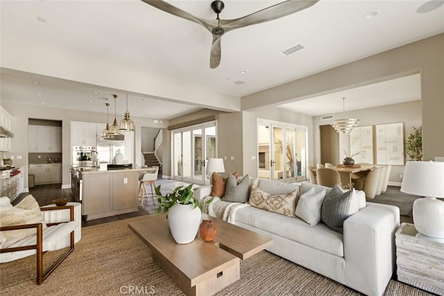 101 Via Artemesia, San Clemente, CA 92672 - living room with stairs, a chandelier, recessed lighting, and ceiling fan
