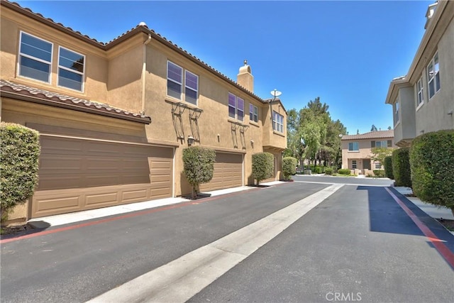 28365 Socorro St Unit 45, Murrieta, CA 92563 - view of asphalt road with a residential view
