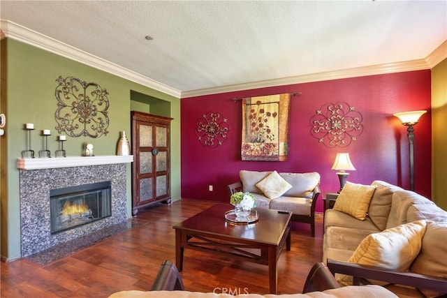 28365 Socorro St Unit 45, Murrieta, CA 92563 - living area with ornamental molding, wood finished floors, a textured ceiling, and a fireplace with flush hearth