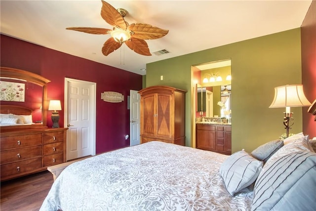 28365 Socorro St Unit 45, Murrieta, CA 92563 - bedroom featuring dark wood-type flooring, a ceiling fan, and connected bathroom