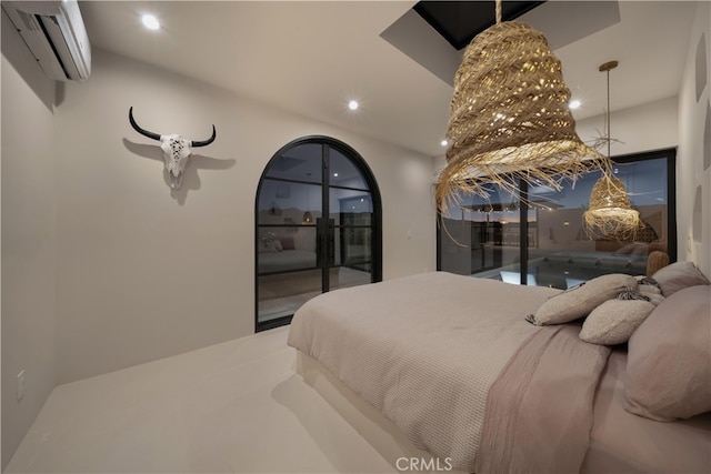 63973 Gold Nugget Rd, Joshua Tree, CA 92252 - bedroom featuring access to outside, a wall unit AC, and recessed lighting