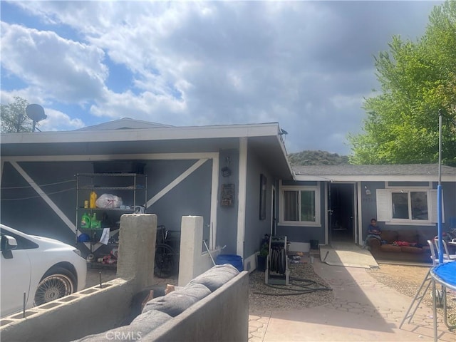 29708 Cromwell Ave, Castaic, CA 91384 - rear view of house featuring stucco siding