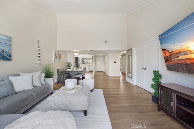 12812 Timber Rd Unit 22, Garden Grove, CA 92840 - living area with wood finished floors and a towering ceiling