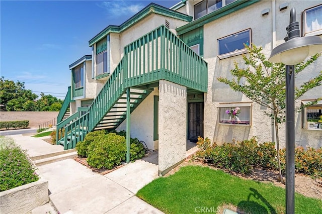 12812 Timber Rd Unit 22, Garden Grove, CA 92840 - view of property featuring stairs
