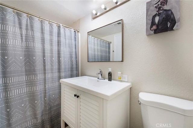 12812 Timber Rd Unit 22, Garden Grove, CA 92840 - bathroom with vanity, toilet, and a shower with curtain
