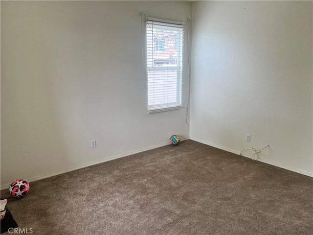 938 Sparrow Way, Perris, CA 92571 - empty room featuring baseboards and dark carpet