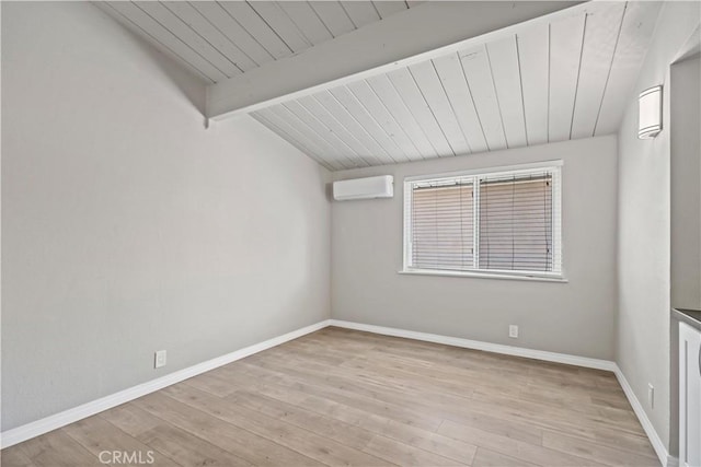 unfurnished room with wooden ceiling, a wall unit AC, vaulted ceiling with beams, and wood finished floors