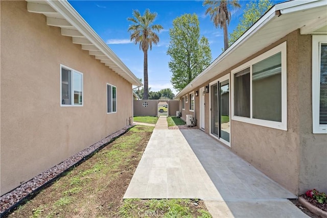 view of yard featuring fence and a patio
