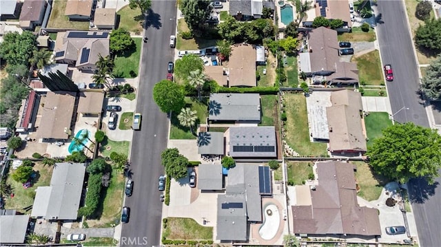 birds eye view of property with a residential view
