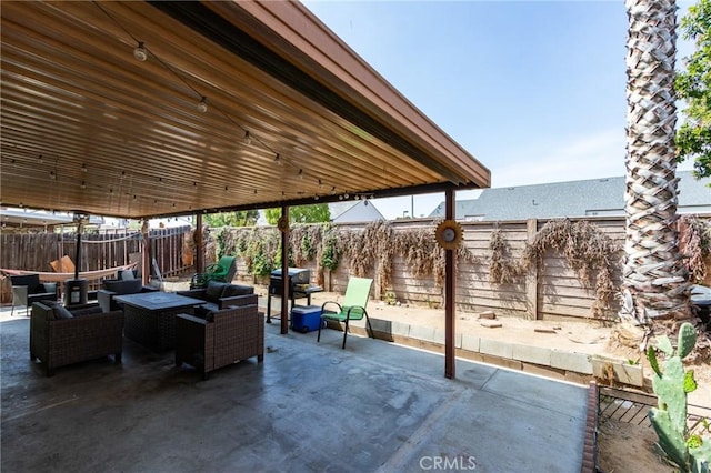 view of patio / terrace with a fenced backyard and outdoor lounge area