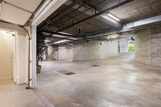 garage featuring concrete block wall