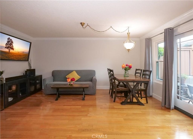 1503 Westmont Dr, San Pedro, CA 90732 - dining area with ornamental molding, light wood-style flooring, and baseboards