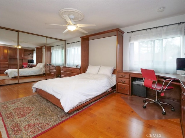 1503 Westmont Dr, San Pedro, CA 90732 - bedroom with wood finished floors, a desk, and ceiling fan