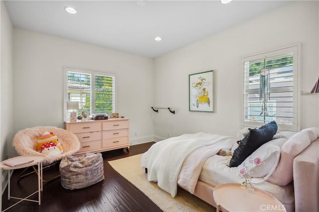 bedroom with recessed lighting, baseboards, and hardwood / wood-style flooring