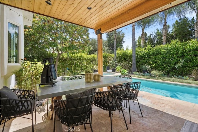view of patio featuring an outdoor pool